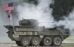 Stryker Dragoon firing 30mm auto cannon